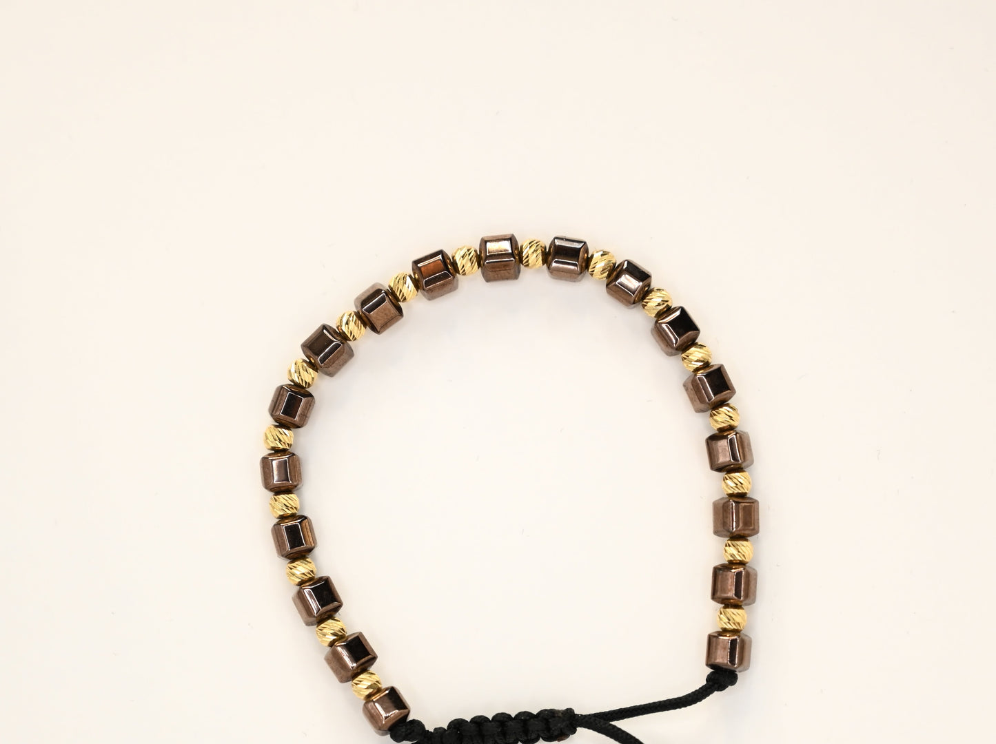 Kralenarmband met gouden accenten en 14 karaat gouden kralen