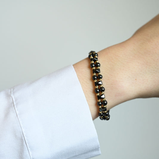 armband met hoogwaardige keramische én 14 karaat gouden kralen