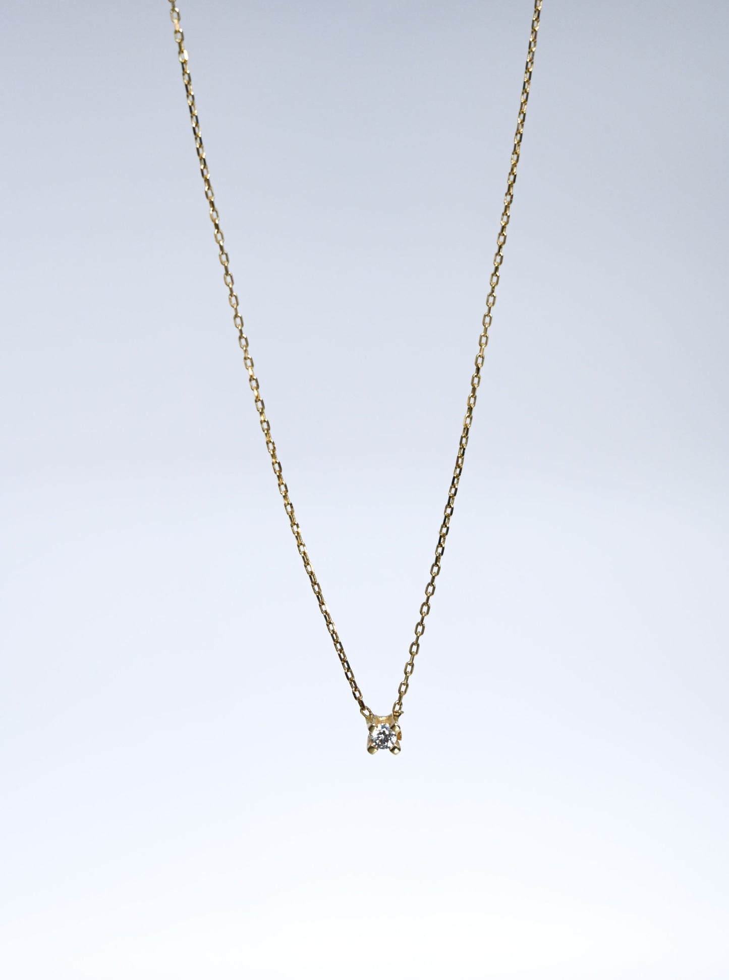 14 karaat gouden ketting met een zirkoniasteen